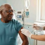 Man getting a vaccine shot