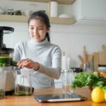Woman making juice